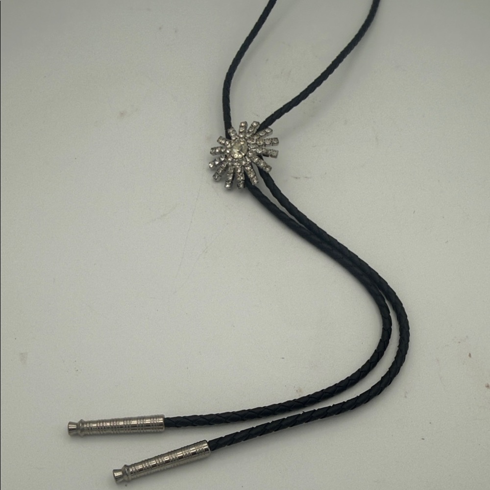 VTG silvertone Bolo tie rhinestone starburst pendant black braid string w/ tips